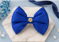 The Royal Sapphire Crest Bow